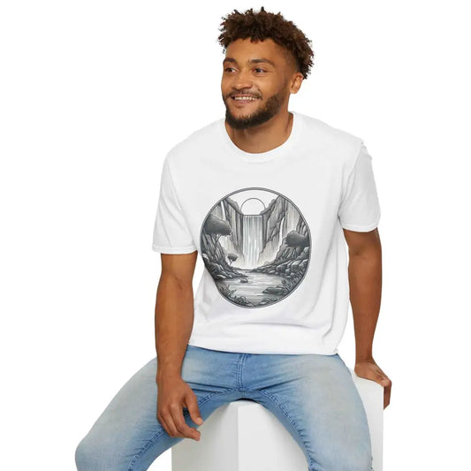 Smiling man wearing a unisex softstyle t-shirt with waterfall and sun graphic made from ethically sourced material