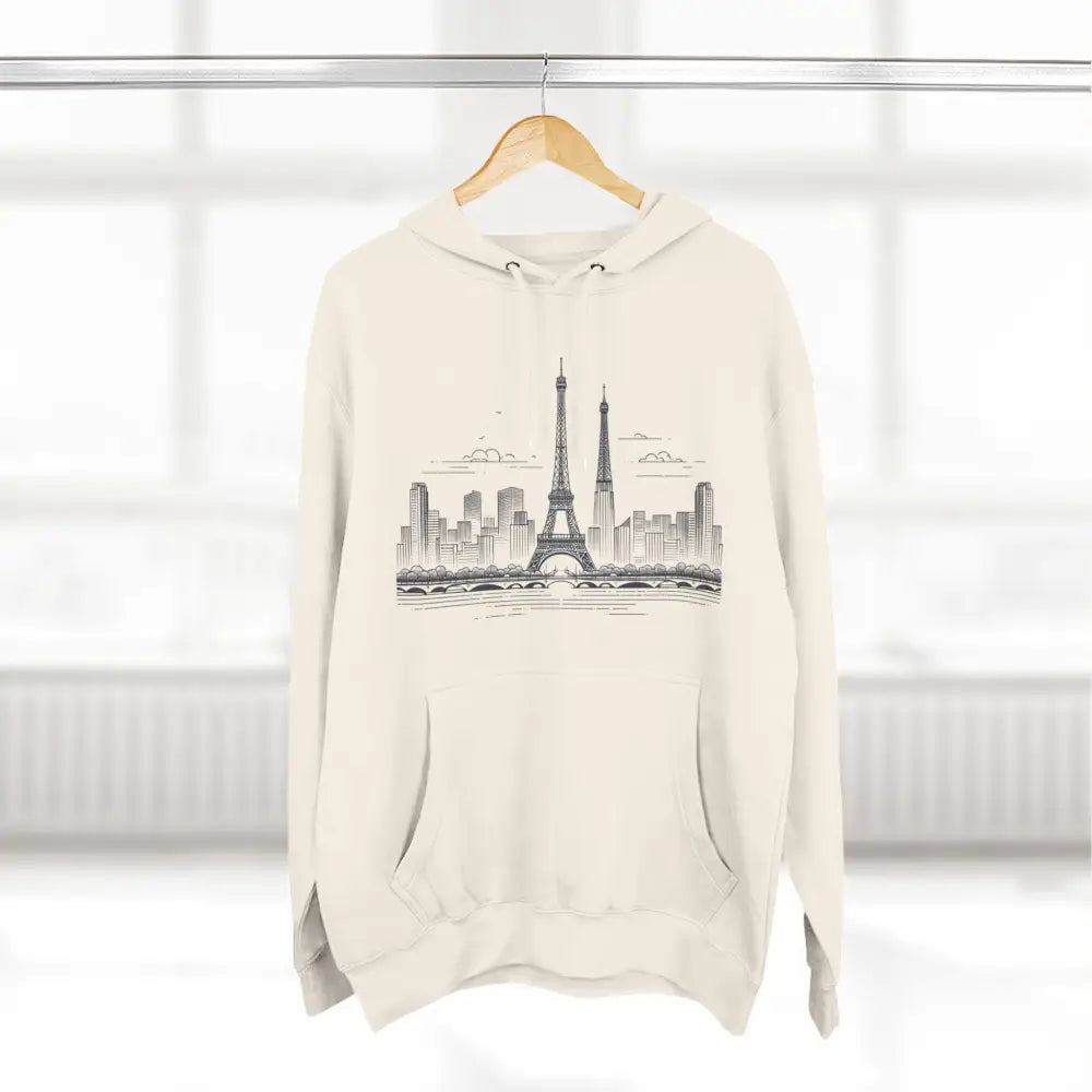 Cream-colored cozy fleece hoodie with Eiffel Tower sketch and city skyline, perfect for urban style