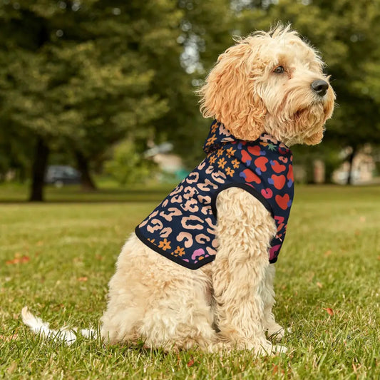 Dog wearing a colorful floral patterned hoodie from PixiOnyx Bold Petwear