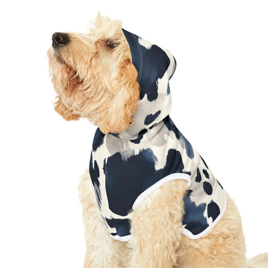 Dog wearing a cow-print hoodie from PixiOnyx Bold Petwear Navy Splash Pattern collection