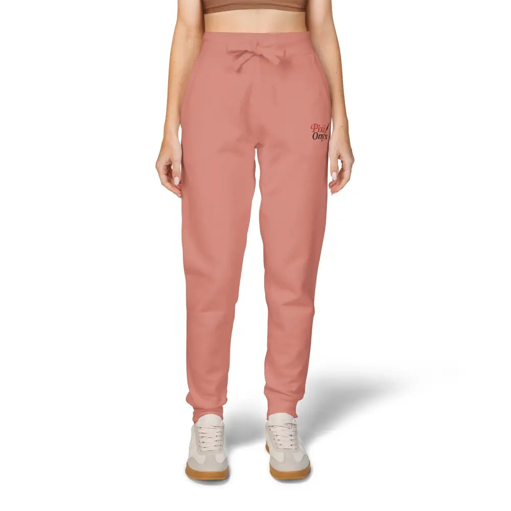 Women’s pink unisex fleece sweatpants with drawstring waist for cozy relaxation and casual wear