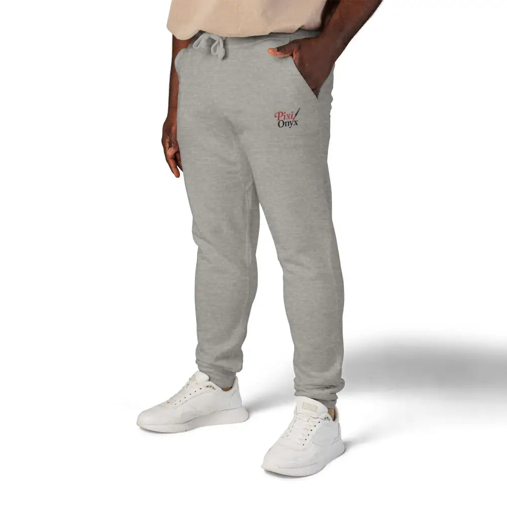 Gray unisex fleece sweatpants with red embroidered logo for cozy relaxation and casual wear