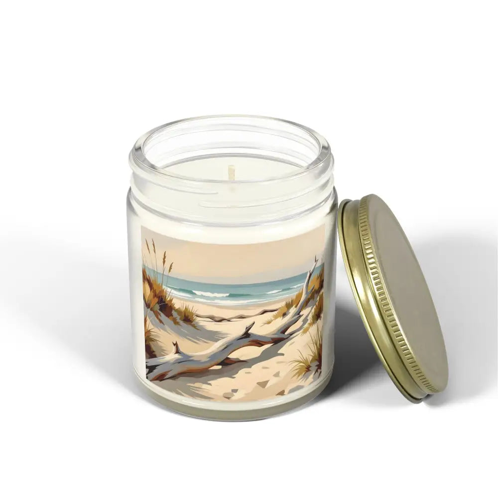 Beach-themed scented candle in glass jar with gold lid from PixiOnyx Coastal Calm Series