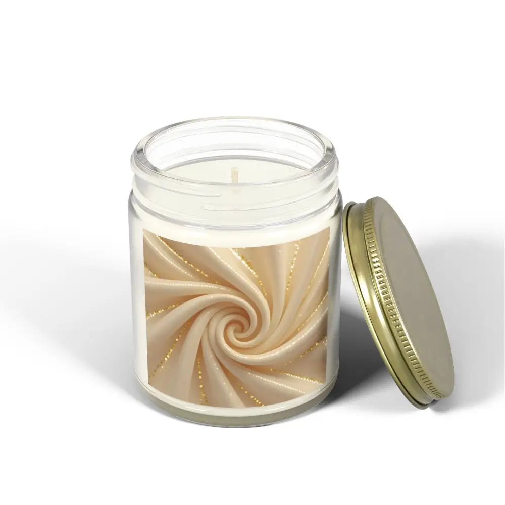 Scented candle in glass jar with decorative label from PixiOnyx Cashmere Musk collection