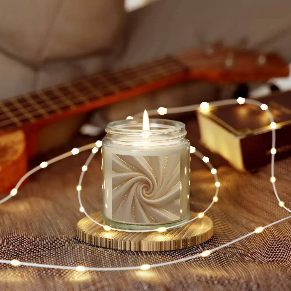 Burning candle with swirl design from Scented Candle Cashmere Musk PixiOnyx