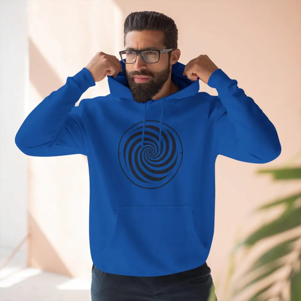 Man wearing a blue fleece hoodie with black spiral design and spacious kangaroo pocket