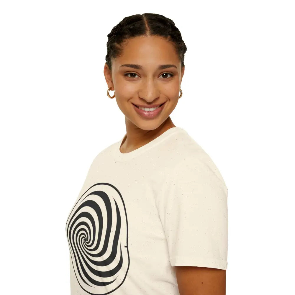 Woman with braided hair wearing a cream-colored unisex softstyle spiral graphic tee made from ring-spun cotton