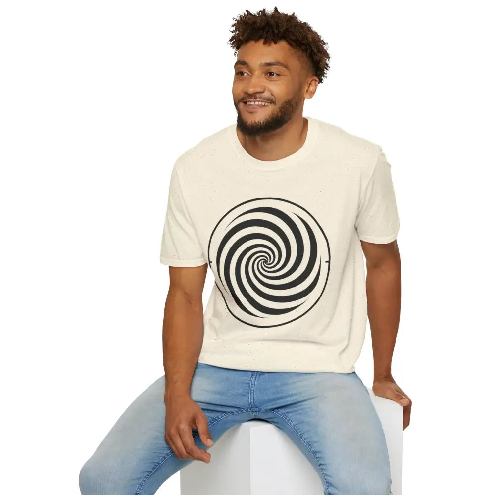 Man wearing unisex softstyle cream spiral graphic tee with light blue jeans