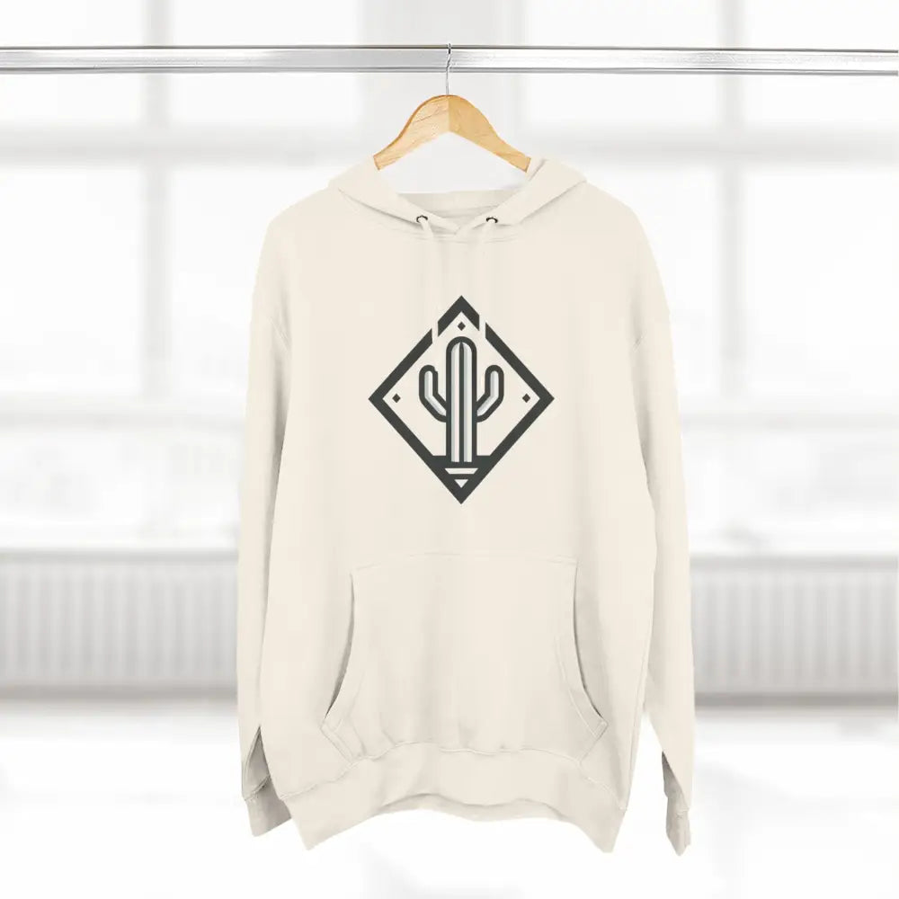 Cream-colored unisex hoodie with black cactus design, spacious kangaroo pocket, and adjustable hood