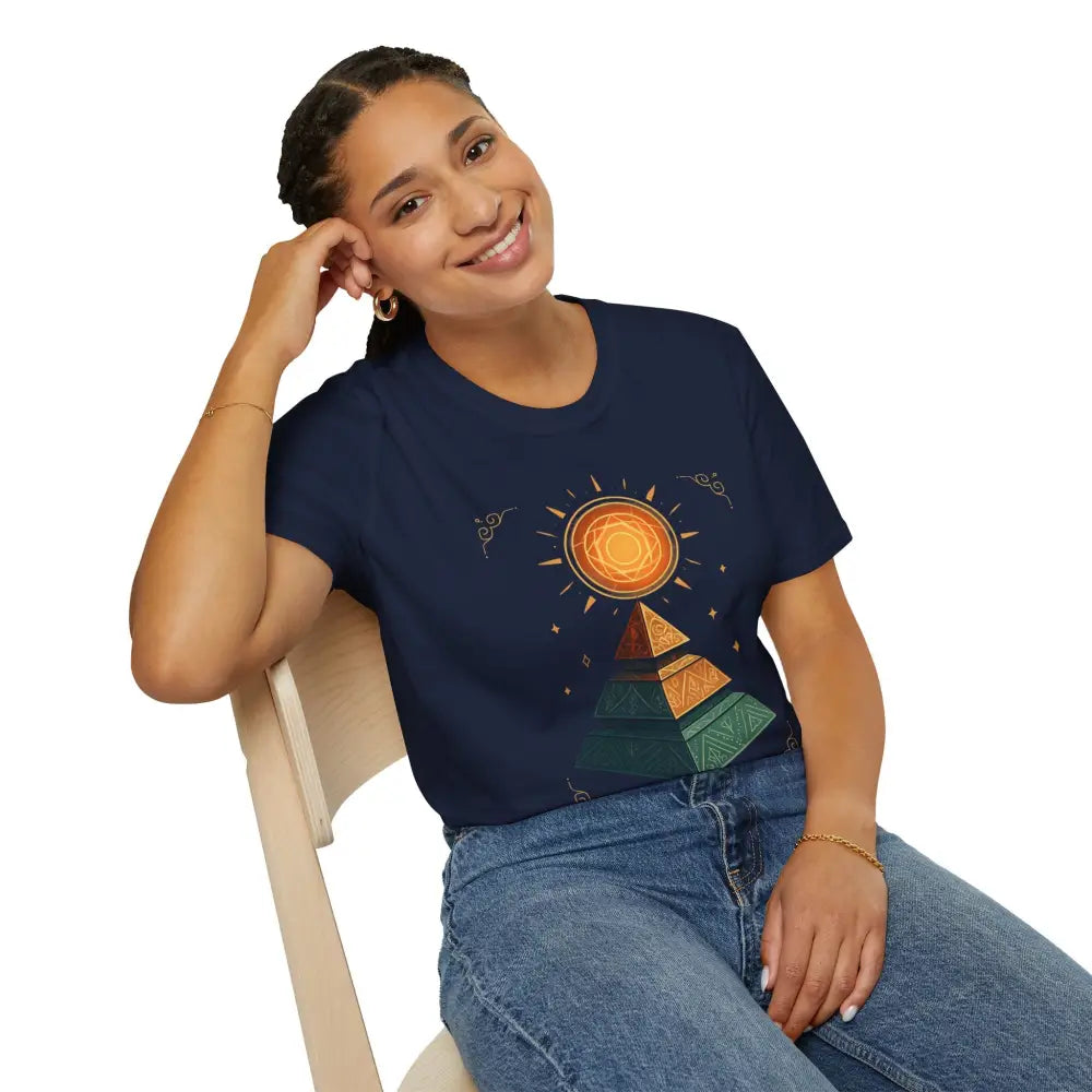 Woman in blue jeans wearing Stylish Pyramid Graphic Tee with sun design, casual summer wear