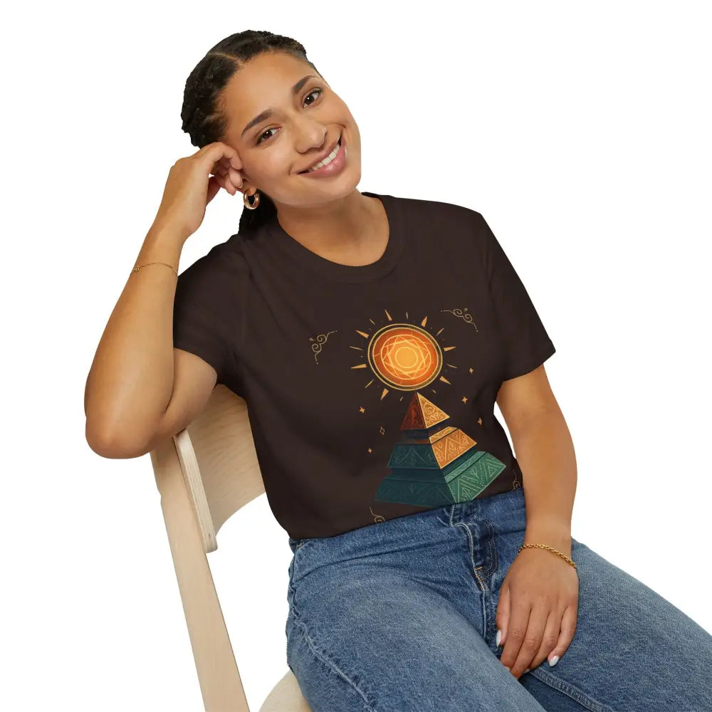 Woman in dark brown pyramid graphic tee and blue jeans, casual wear for nature lovers