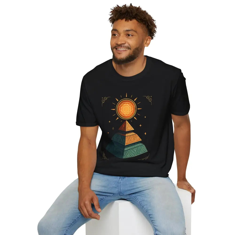 Man modeling black pyramid graphic tee with sun design, ideal for summer and casual wear