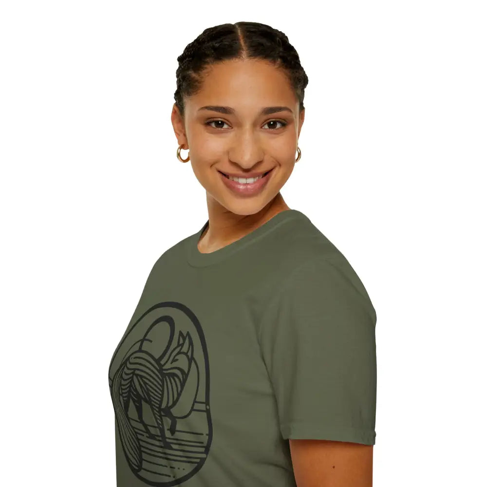 Smiling woman in dark olive green graphic T-shirt with abstract fox design, machine washable low heat tumble dry summer fashion