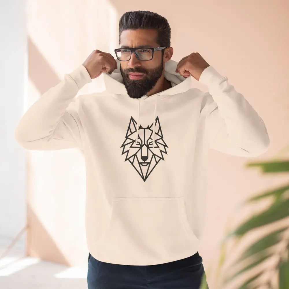 Man wearing a white hoodie with a stylish wolf graphic design for outdoor adventures