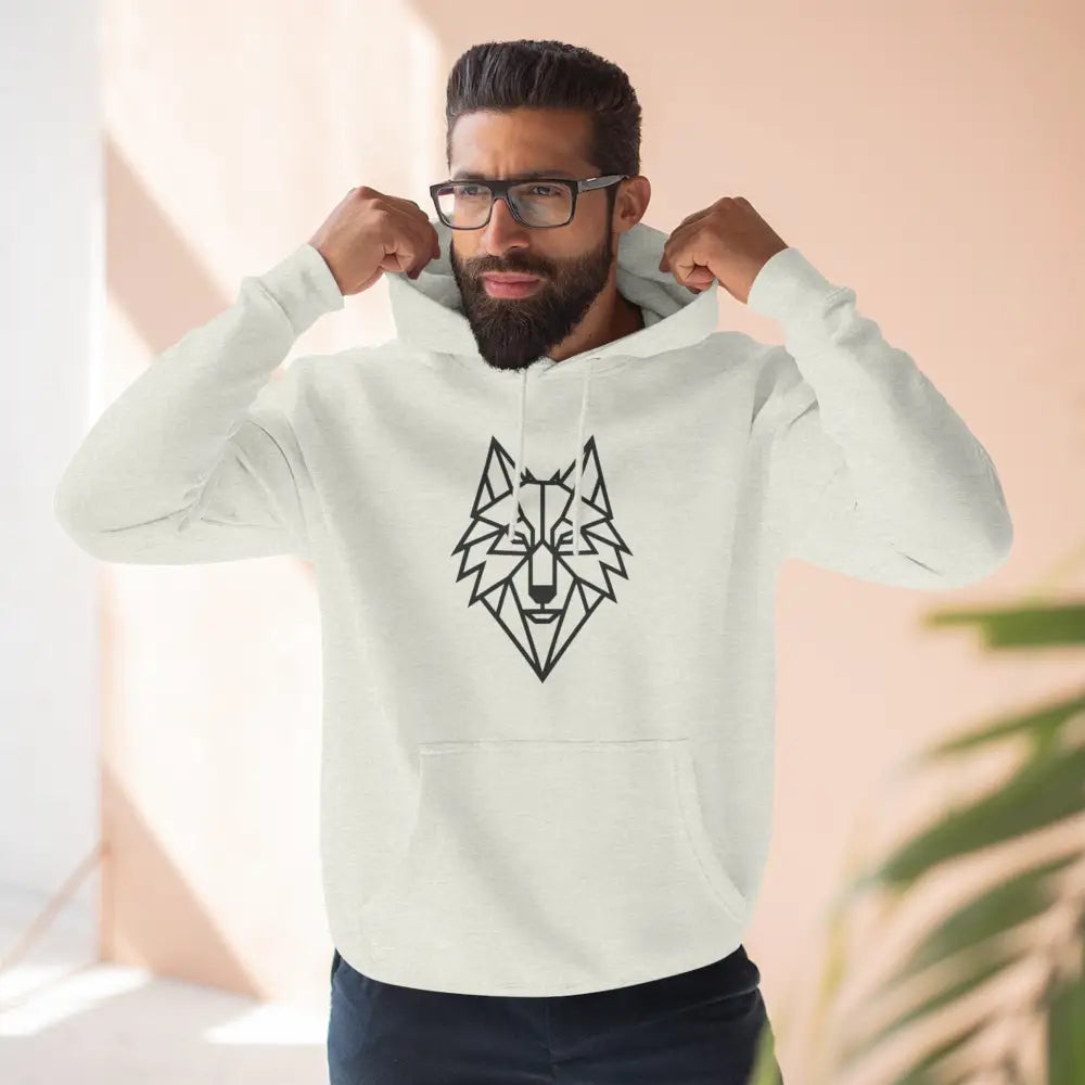 Man wearing a stylish wolf graphic unisex hoodie with black geometric wolf design for outdoor adventures