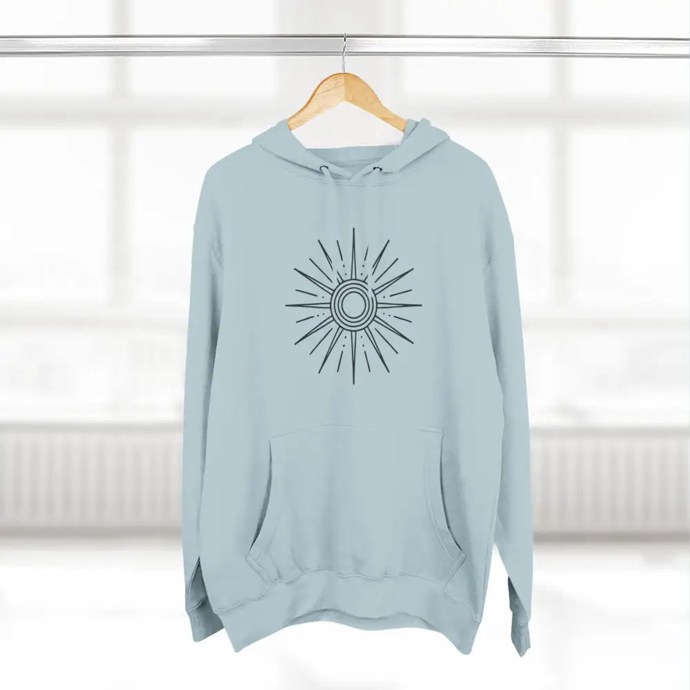 Light blue fleece hoodie with sun graphic, spacious kangaroo pocket, perfect for winter layering