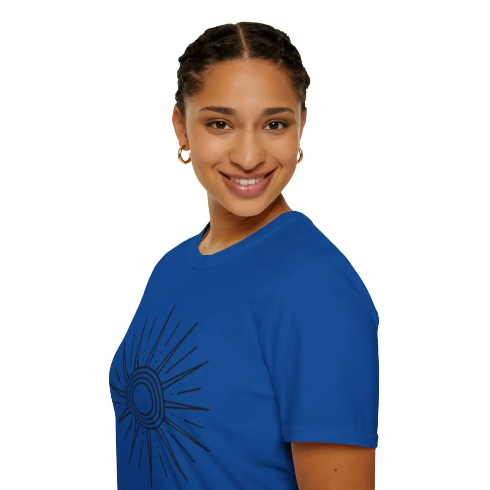 Woman wearing a blue Sunshine Graphic Unisex Softstyle T-Shirt with sun design for outdoor fun
