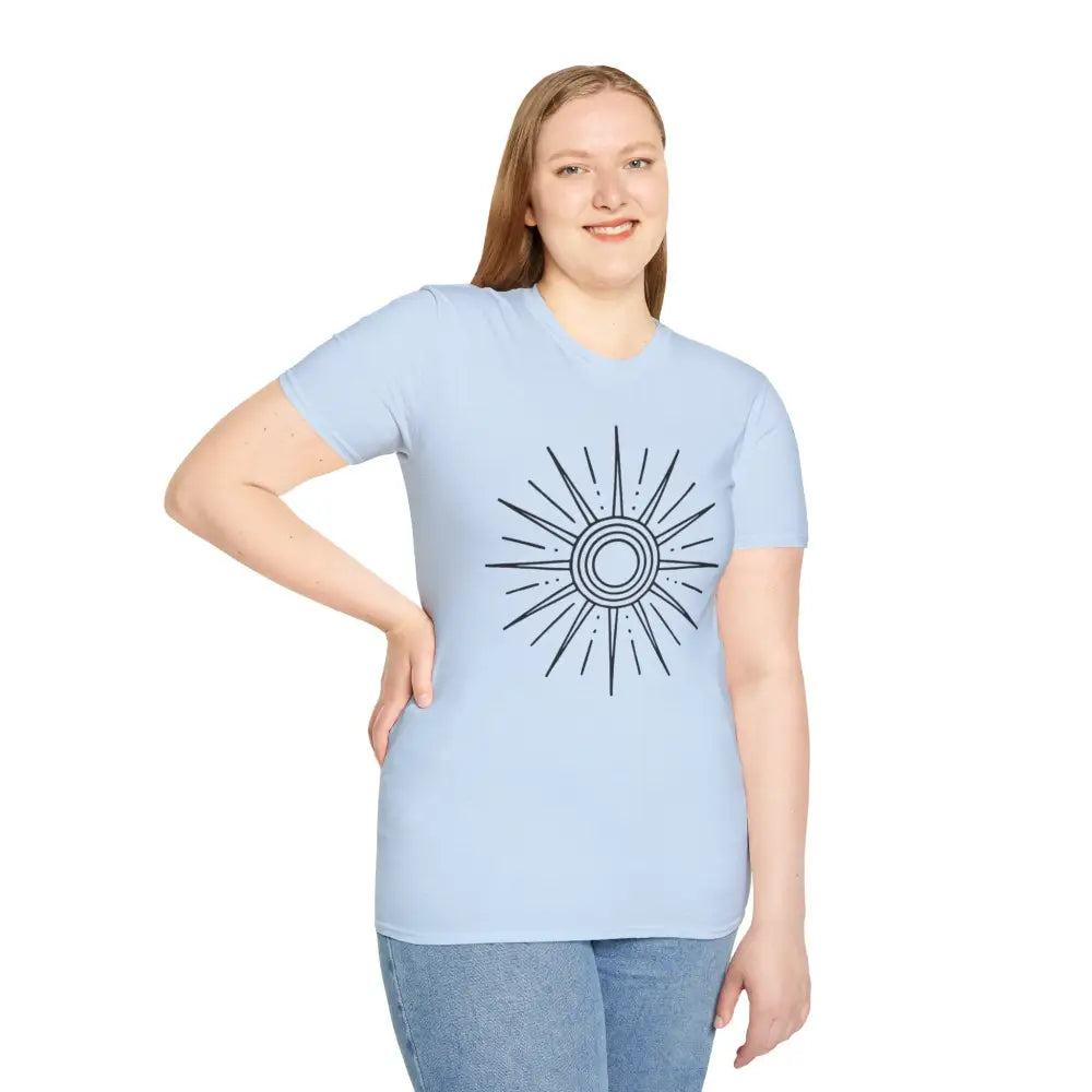 Smiling woman in Sunshine Graphic Unisex Softstyle T-Shirt with sunburst design and casual style