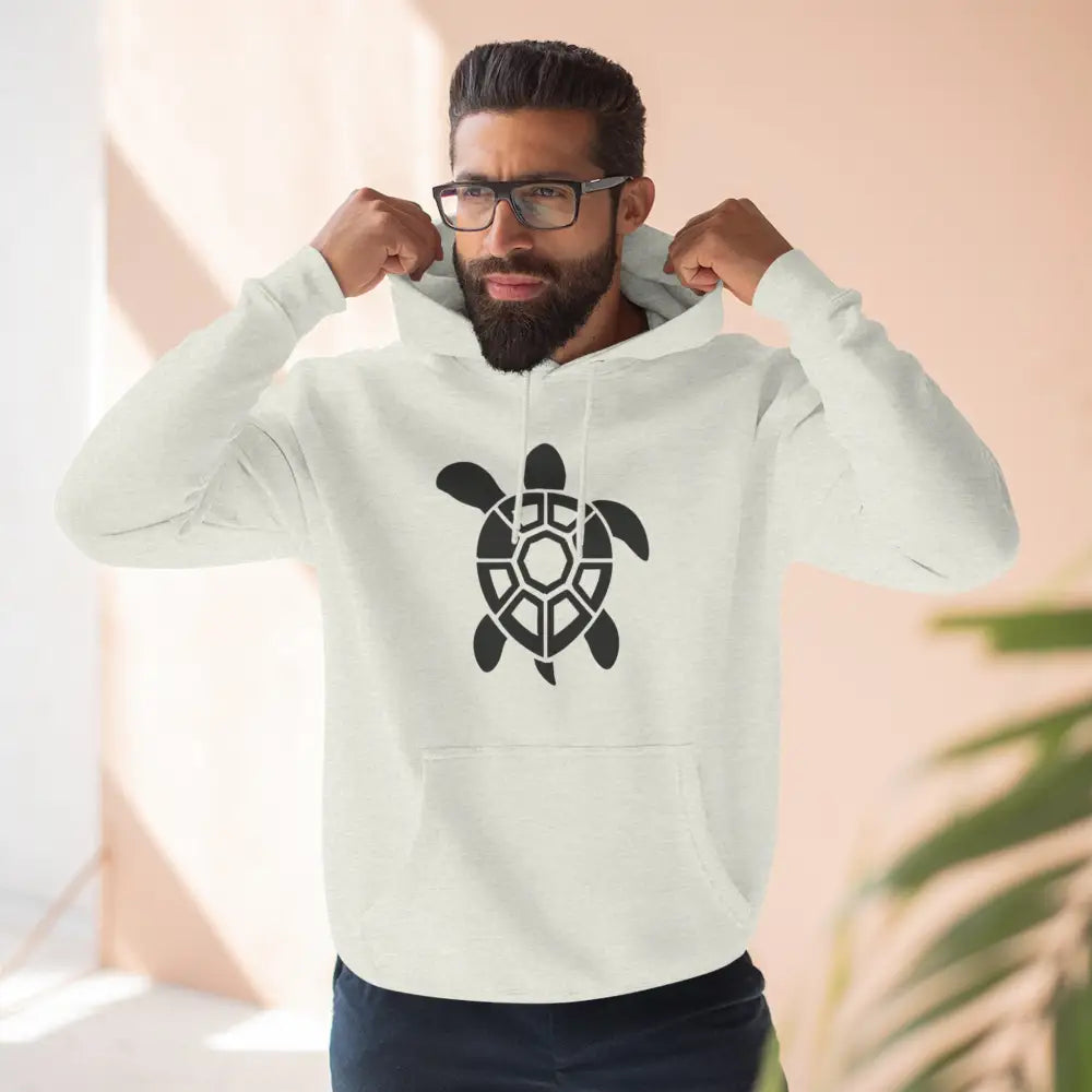 Man wearing white fleece hoodie with turtle graphic for casual outings and nature lovers