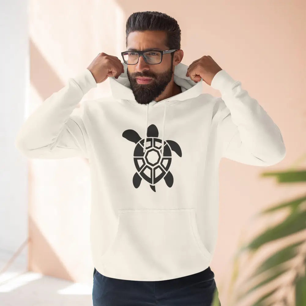 Men’s cream-colored fleece hoodie with black turtle graphic, perfect for casual outings