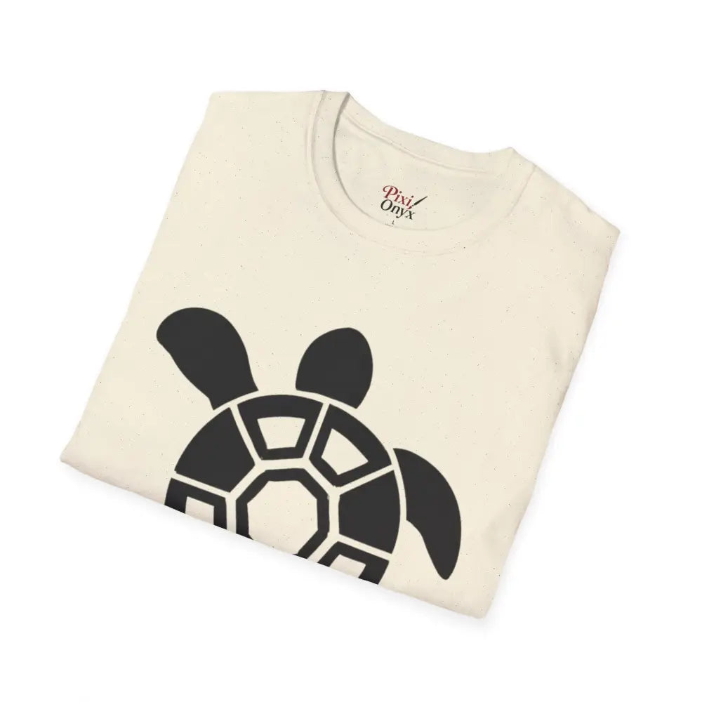Cream-colored unisex t-shirt with black sea turtle graphic, eco-friendly casual wear