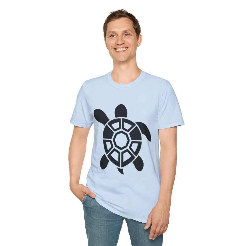 Man wearing a light blue Turtle Graphic Unisex Tee with casual jeans, eco-friendly fabric