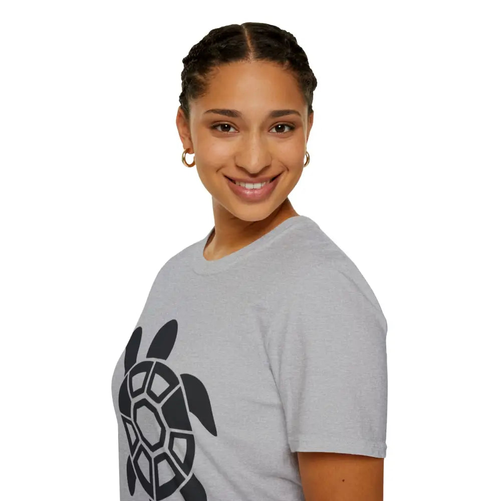 Woman with braided hair and hoop earrings wearing a Turtle Graphic Eco-Friendly T-Shirt