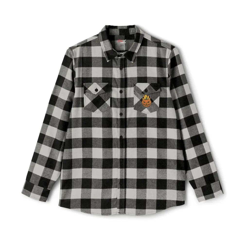 Black and white buffalo plaid flannel shirt with flaming pumpkin design at pumpkin patch