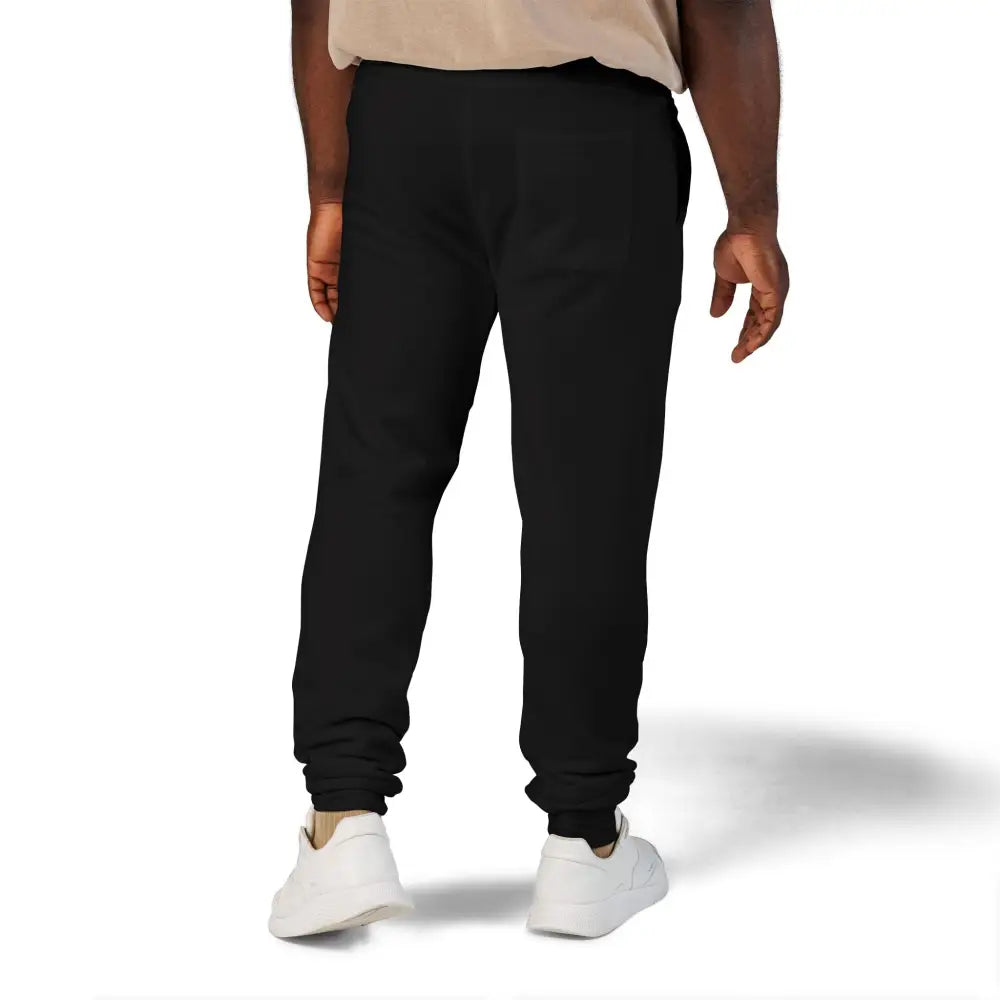 Black fleece sweatpants with elastic cuffs from Flaming Pumpkin collection for cozy Halloween streetwear