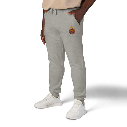 Gray fleece sweatpants with flaming pumpkin graphic for cozy Halloween streetwear