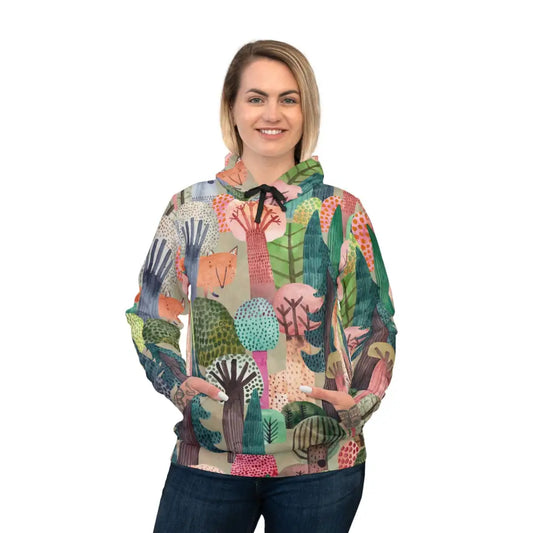 Woman wearing a colorful patterned hoodie from PixiOnyx Dreamcore Loungewear collection