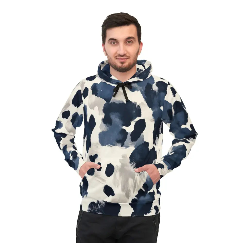 Man wearing a blue and white patterned hoodie from PixiOnyx Inkveil Drift collection
