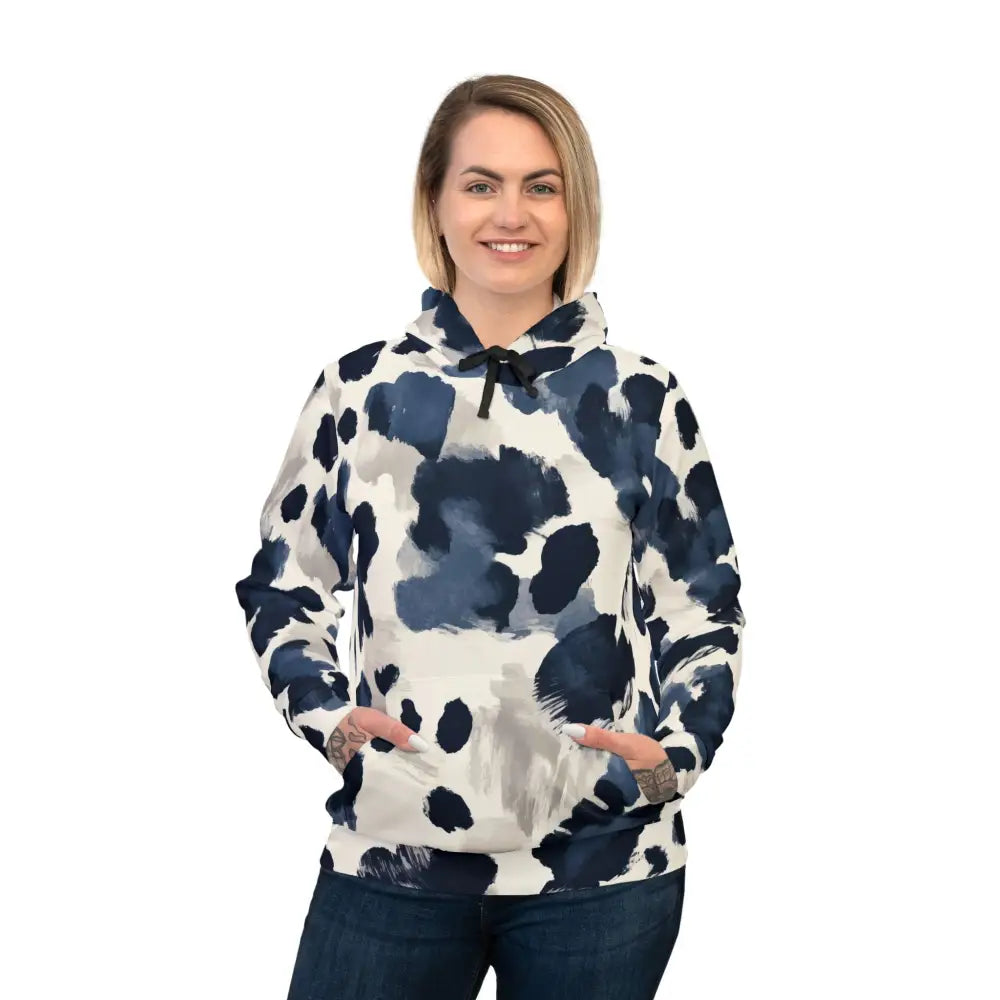 Woman wearing a blue and white patterned hoodie from Inkveil Drift abstract motionwear