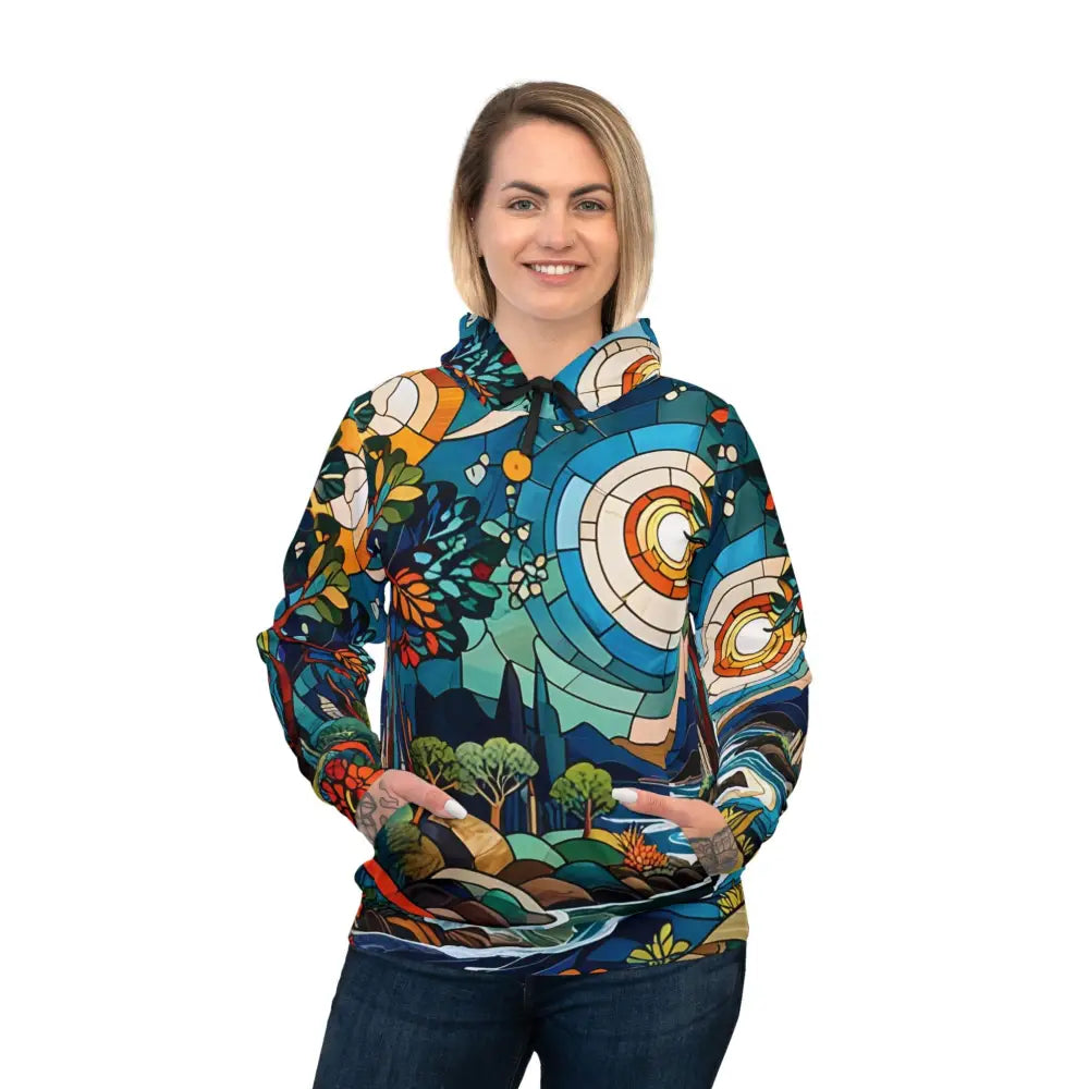 Woman wearing a vibrant stained horizon psychedelic abstract naturewear hoodie