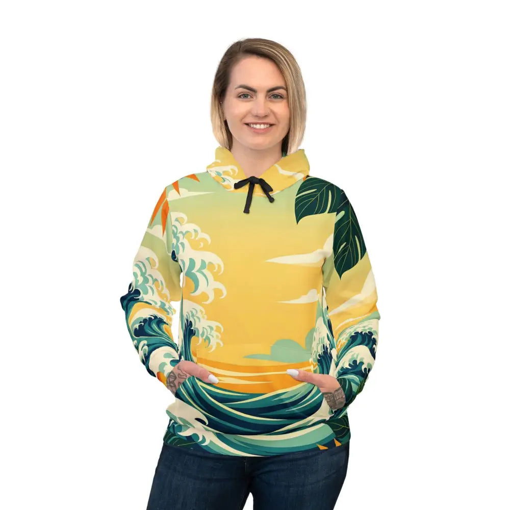 Woman wearing a wave-patterned tropical wave hoodie from PixiOnyx Mango Coastwear