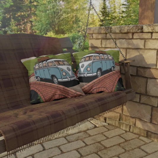 Wooden porch swing with plaid blanket and blue Volkswagen vans pillows for outdoor decor