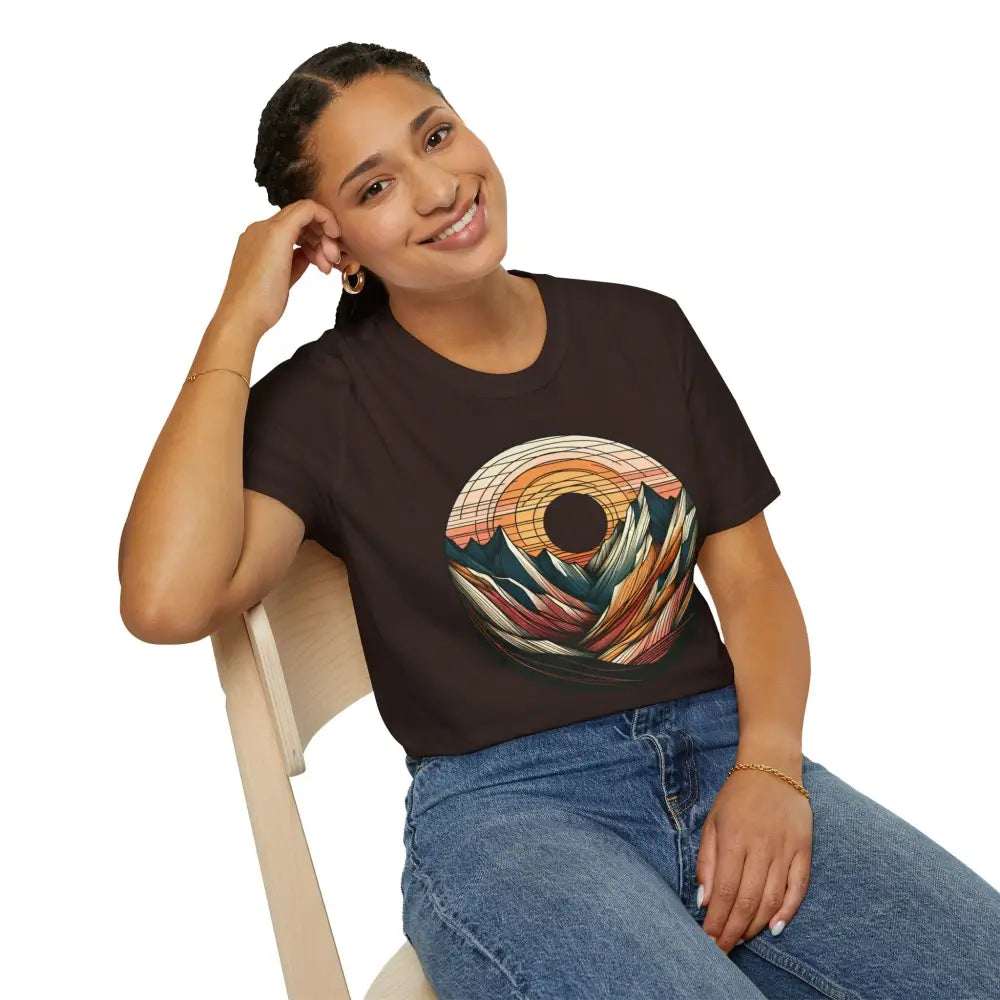 Woman wearing a vintage mountain vibes softstyle t-shirt with elastic ribbed collar and sunset graphic