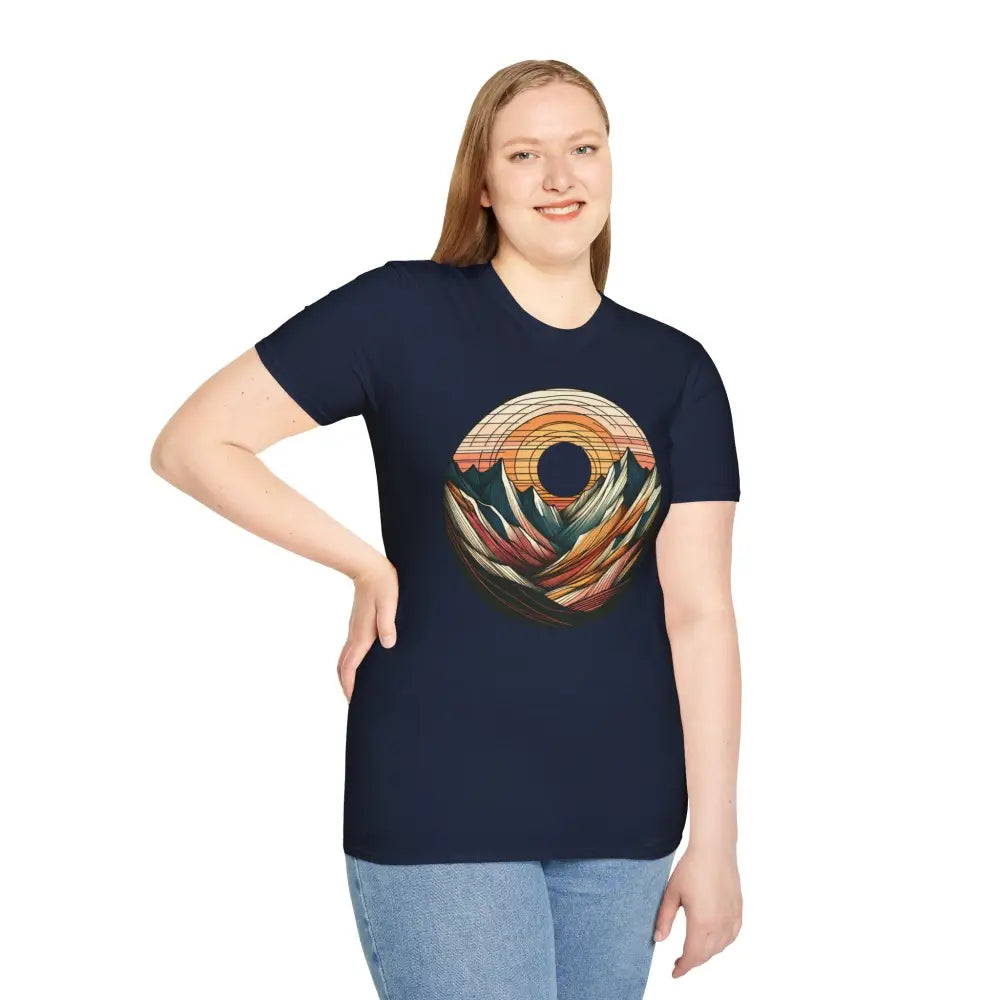 Woman wearing a vintage mountain vibes softstyle t-shirt with colorful sunset graphic