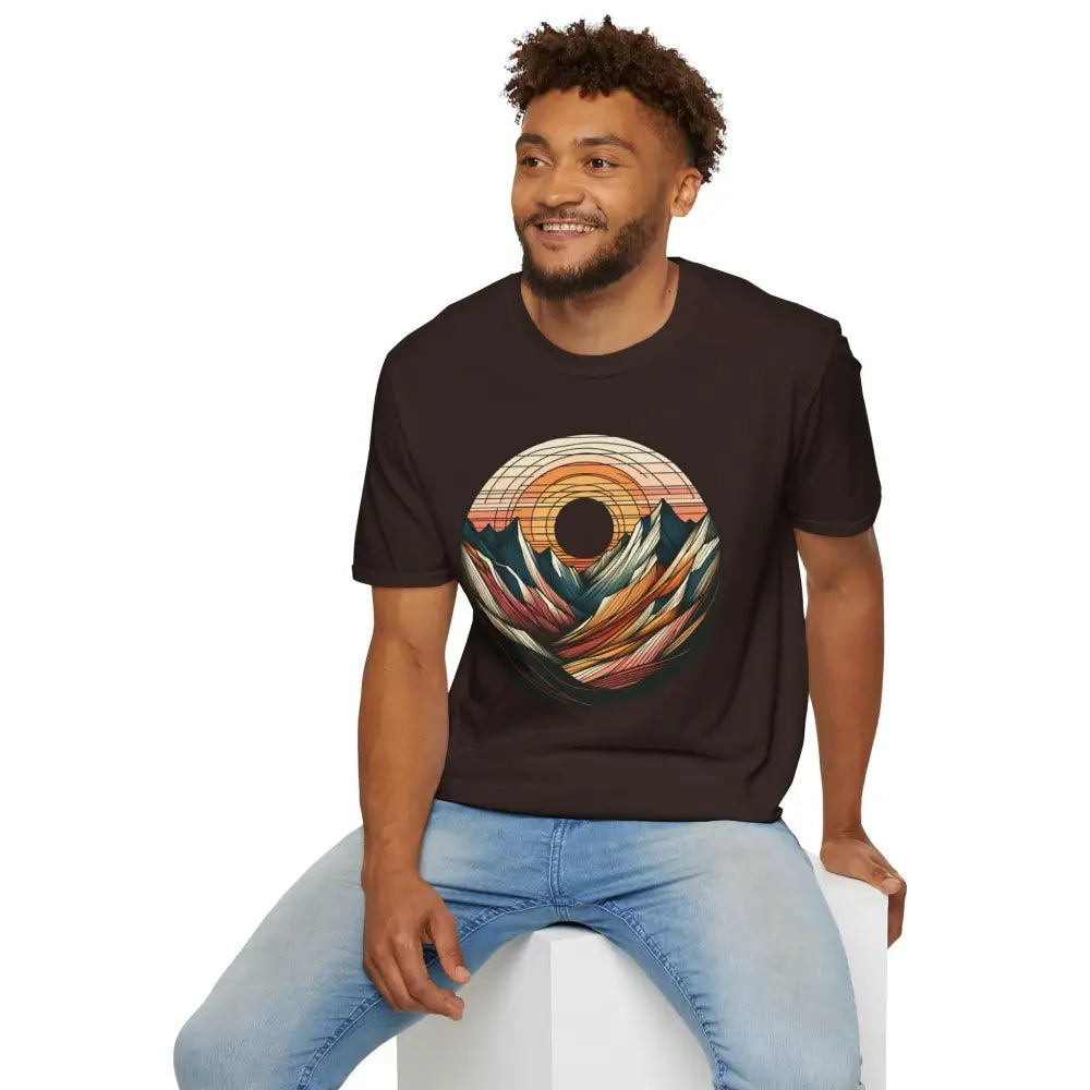Man modeling vintage mountain vibes softstyle t-shirt with colorful landscape design