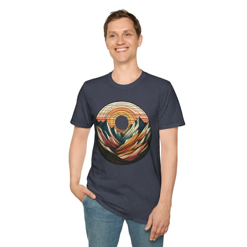 Man wearing navy blue Vintage Mountain Vibes softstyle t-shirt with colorful mountain sunset graphic